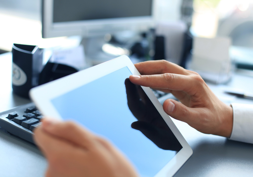 businessman holding digital tablet